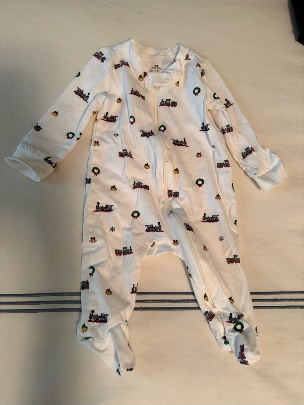 Petite Plume Holiday Train Print White Baby Footed One-Piece